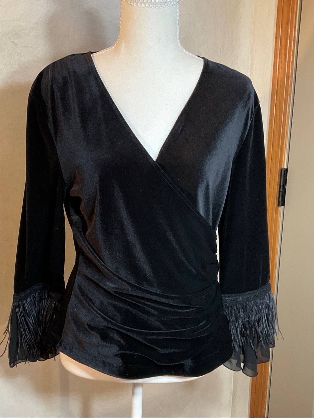 Cachet Black Velvet Wrap Blouse with Feather Cuff